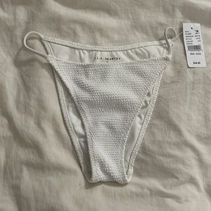 NEVER WORN Cheeky string high leg height waisted bikini bottom